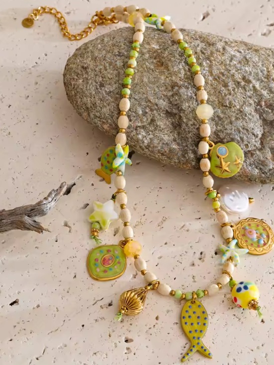 Anthropologie Jewelry - Beachy Green Fish Gold Charm Necklace